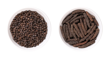 Dried black peppercorns and long pepper catkins, in white bowls. Berries of Piper nigrum, and fruits of Piper longum, sometimes called pippali. Used as spice and seasoning, both with similar taste. - obrazy, fototapety, plakaty