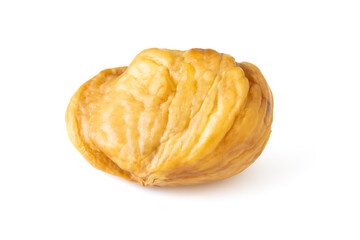 Macro photo of a delicious roasted and peeled chestnut | castanea sativa on white background.