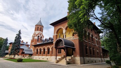Fototapeta na wymiar The Episcopal Palace at Curtea de Arges, Romania, the former summer residence of King Carol I.