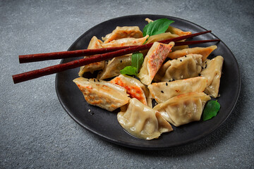japanese fried dumplings, gyoza, sesame seeds, top view, no people,