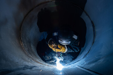 electric welder while working in the pipe