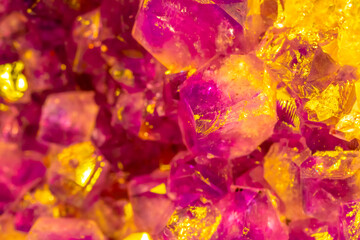 Multi-colored crystal mineral stone. Gems. Mineral crystals in the natural environment. Texture of precious and semiprecious stones. shiny surface of precious stone