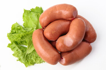 Boiled sausages on a white background. Flat lay. Top view. Copy space. Isolated object.