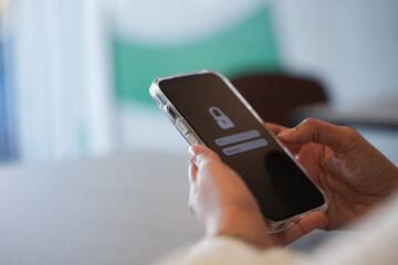 Cyber security concept with people holding smartphone screen show login.