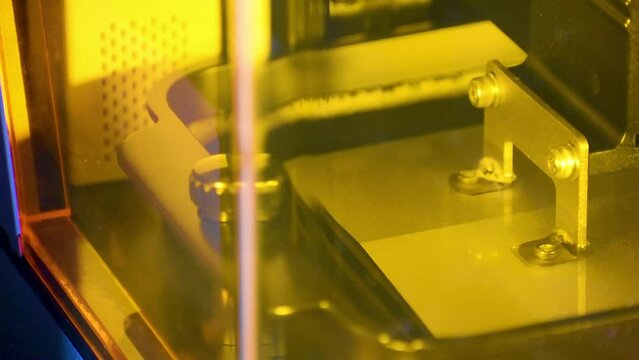 Detail of a 3d resin printer in operation