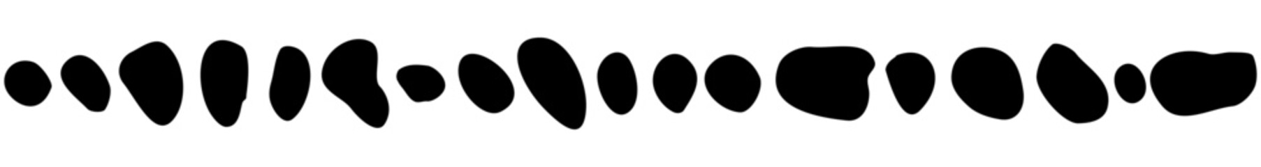 Stripe of dots and spots of different sizes and different shapes, isolated on a transparent background. Black vector dotted line design element. Hand-drawn spotted brush