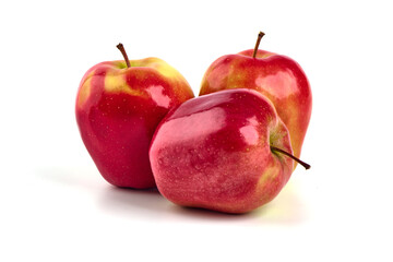 Shiny Red ripe apples, isolated on white background. Fresh raw organic fruits.