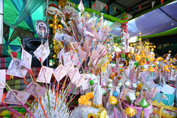 Thai Baht bank notes decorated in a tree shape as money to be donated for merit making in Kathina...