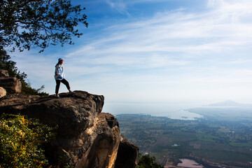 Travelers thai women people travel visit and take photo on ridge stone of cliffs Khao Phraya Doen...