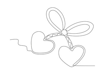 A love-shaped Martisor. Martisor one-line drawing