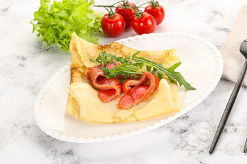 Russian pancake with salmon fish
