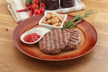Grilled beef burger cutlet with sauce
