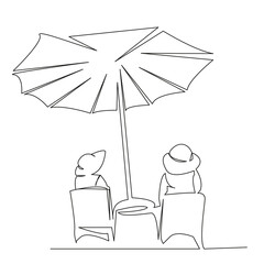 girls on the beach in sun loungers under an umbrella