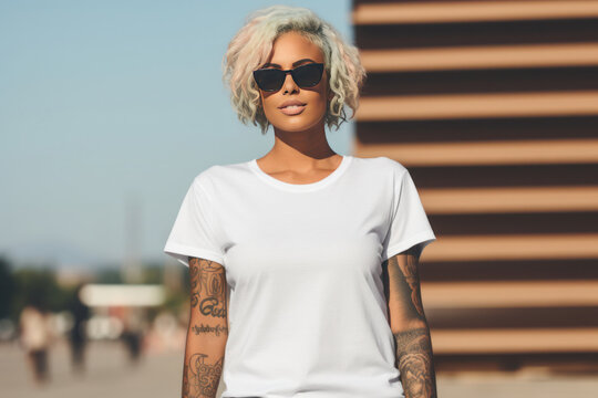 Young woman wearing canvas white t-shirt mockup. Design tshirt template, print presentation mock-up. Close up. Lifestyle, street, outside.