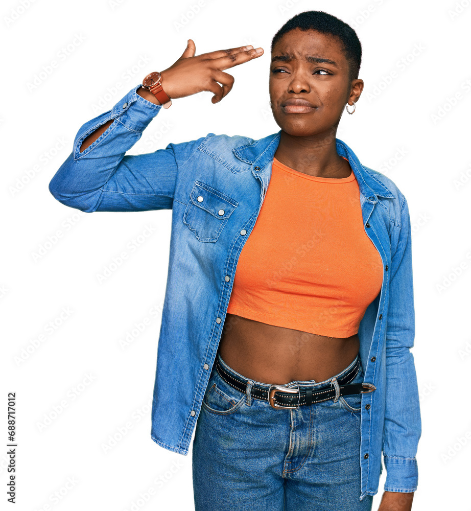 Canvas Prints Young african american woman wearing casual clothes shooting and killing oneself pointing hand and fingers to head like gun, suicide gesture.