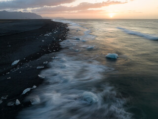 Sunrise at the Diamond Beach, Fellsfjara black sand beach, Vatnajökull Glacier National Park, Iceland.
