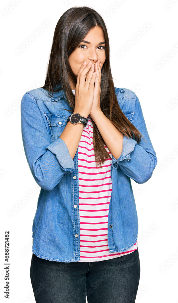 Canvas Prints young brunette woman wearing casual clothes laughing and embarrassed giggle covering mouth with hand