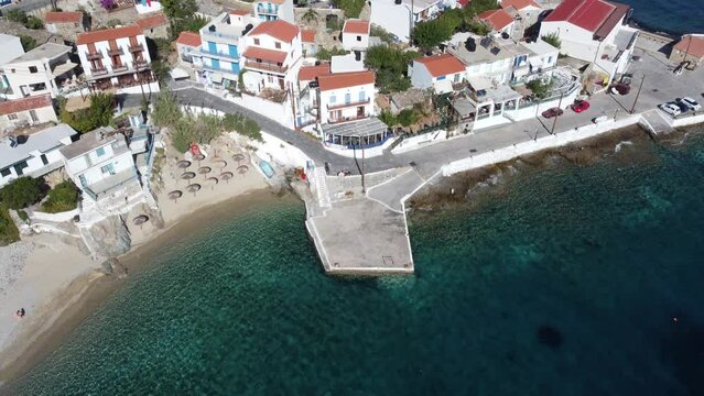 Aerial drone view of Armenistis fisher town in Ikaria. Classical Greek town of the Aegean Islands