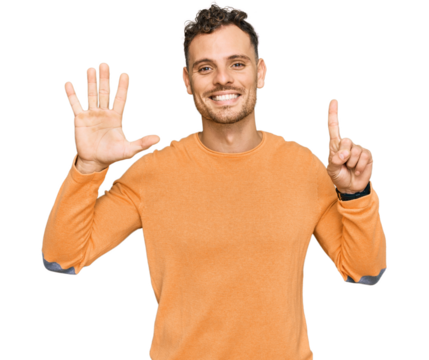 Young hispanic man wearing casual clothes showing and pointing up with fingers number six while smiling confident and happy.