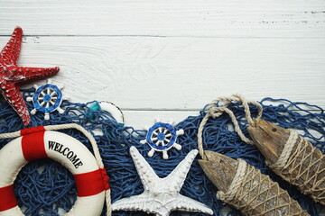 Nautical and summer background top view on wooden background