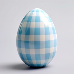 Obraz premium Blue and white checkered egg on a light backdrop