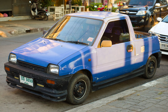 SUKHOTAI, THAILAND - DECEMBER 25, 2018: A little pickup of Daihatsu Mira on a city street