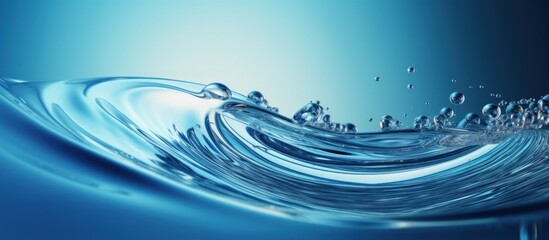 Closeup macro transparent water drop with ripples and waves isolated on a blue background