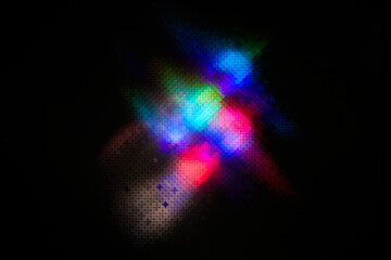 Blurred Glow Effect. Defocused rainbow colourful light on a dark abstract background. Defocused Light Leaks for Trend Design.