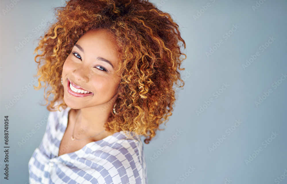 Wall mural Portrait, happy and creative business woman isolated on a gray background mockup space. Face smile, professional designer and entrepreneur, young employee or person working at startup in South Africa