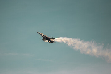 Fighter Jet mid air pulling a stunt during an Airshow in austria