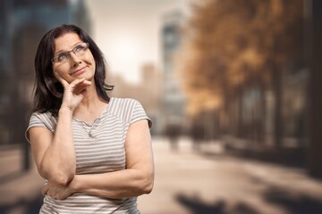 Middle age woman standing with crossed arms gesture