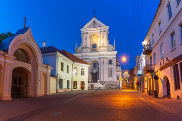 Fototapeta na wymiar Picturesque Street and Church in Old Town of Vilnius, Lithuania, Baltic states.