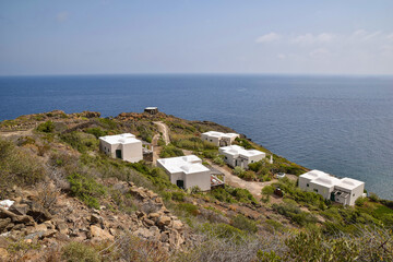 Panoramic view with traditionals houses on the promontory, Pantelleria island IT - 688749051