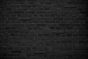 Old black brick wall texture. grunge background