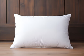 White pillow on wooden table