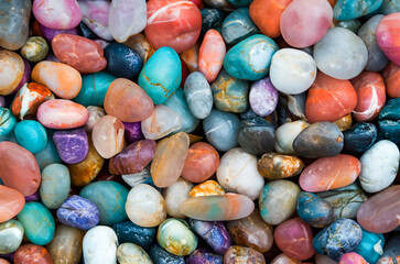 colorful pebbles on the beach | colorful stones background | colorful pebbles background