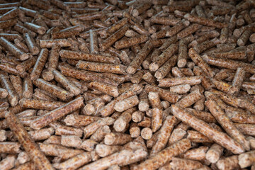 Wooden pellets. Ecologic fuel made from biomass. Renewable energy source. Top view.