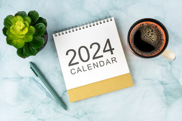2024 Desk Calendar, Pen and cup of coffee flat lay - obrazy, fototapety, plakaty