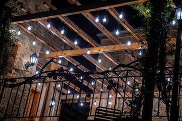 illuminated veranda at an old stone house in the Lebanon city of Batroun