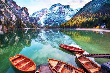 Foto op Plexiglas Magical autumn landscape with boats on the lake on Fanes-Sennes-Braies in the Dolomites Alps, Italy. (mental vacation, holiday, inner peace, harmony - concept) © anko_ter
