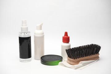 Fototapeta na wymiar Shoe care products or accessories on a white background