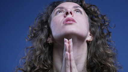 Frustrated young woman covering face with hands feeling regret and anxiety, close-up face of female...