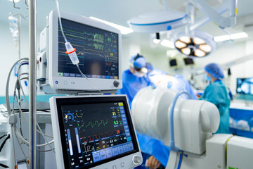 A hospital room with monitors and medical equipment. A Modern Hospital Room with Advanced Medical Equipment