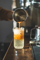 The making of an espresso tonic