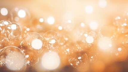 Bright golden champagne bubbles on blurred bokeh background