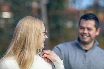 A young couple enjoying time together in autumn outdoors