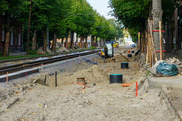 Complete reconstruction of the street with tram track and underground communication pipes...