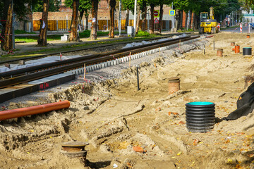 Fototapeta premium Complete reconstruction of the street with tram track and underground communication pipes replacement