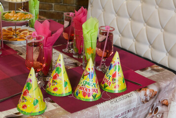 Festive table at children's birthday party close-up