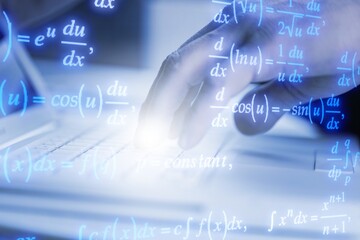 male hands on laptop keyboard with mathematical formulas
